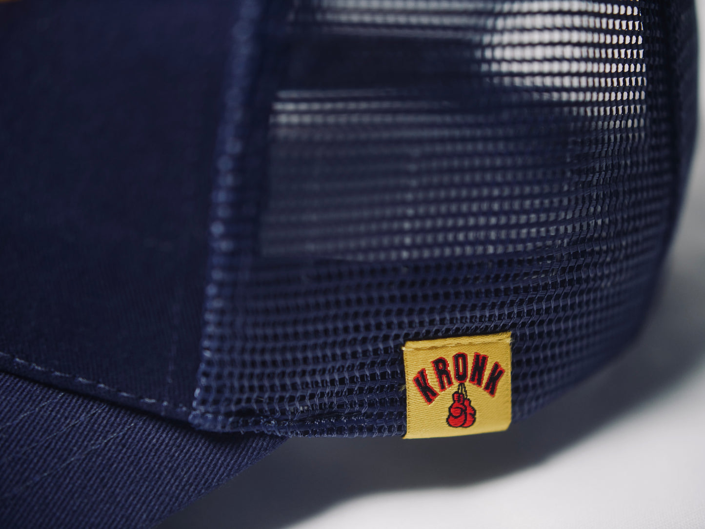 KRONK Gloves Trucker Cap: Navy with 3D Red & Yellow Embroidery