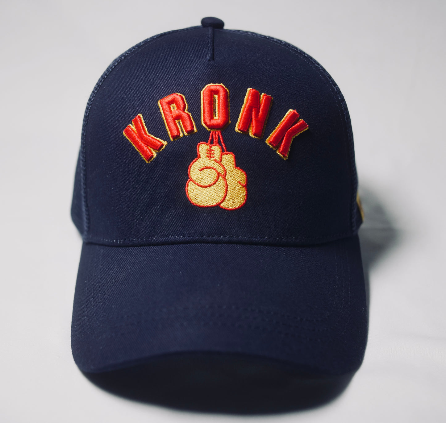 KRONK Gloves Trucker Cap: Navy with 3D Red & Yellow Embroidery