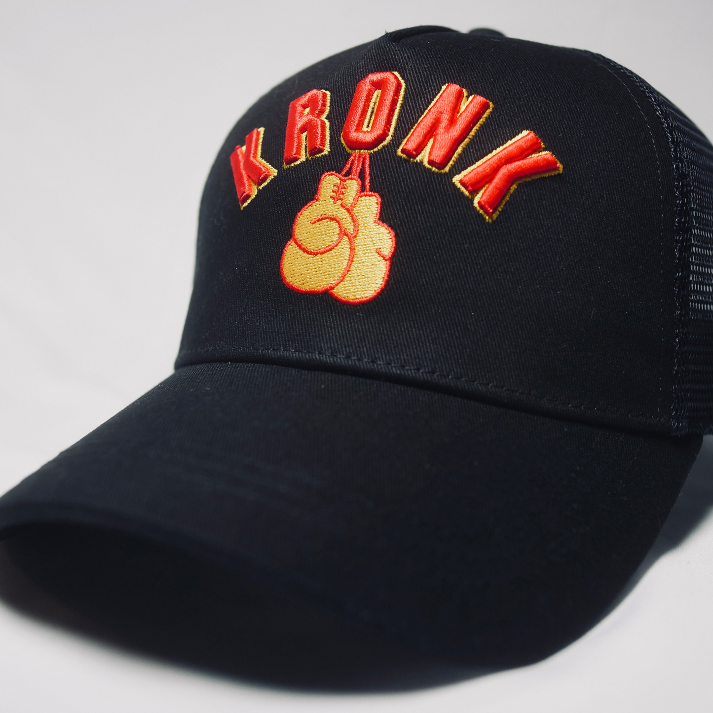 KRONK Gloves Trucker Cap: Black with 3D Red & Yellow Embroidery