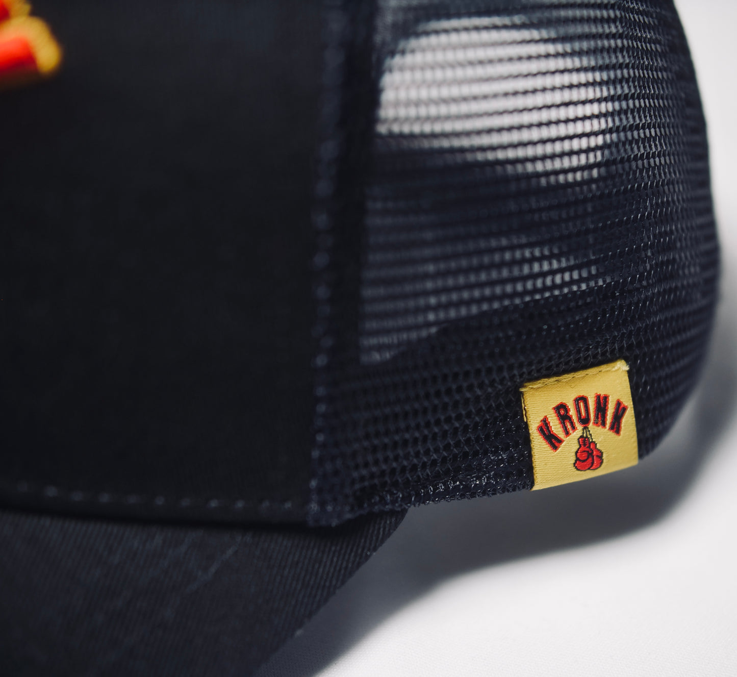 KRONK Gloves Trucker Cap: Black with 3D Red & Yellow Embroidery