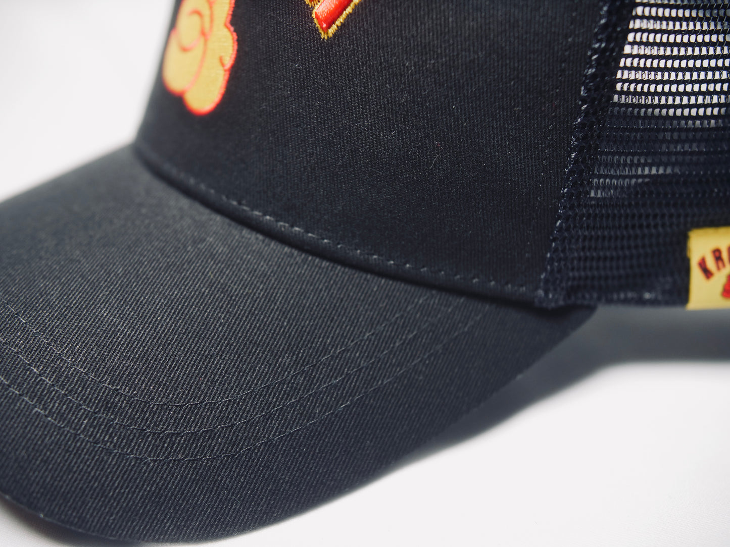 KRONK Gloves Trucker Cap: Black with 3D Red & Yellow Embroidery