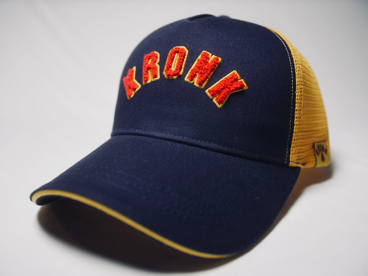 KRONK WAR Trucker Cap: Navy with Yellow Mesh and Red & Yellow Towelling Embroidery