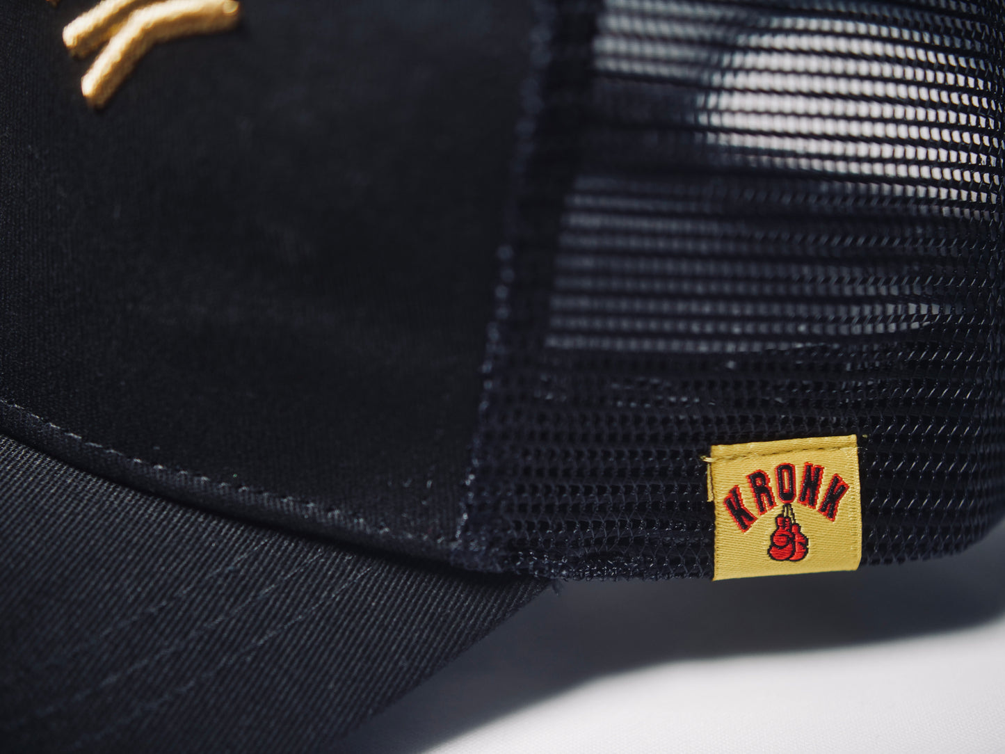 KRONK Olympic Trucker Cap: Black with 3D Gold Embroidery